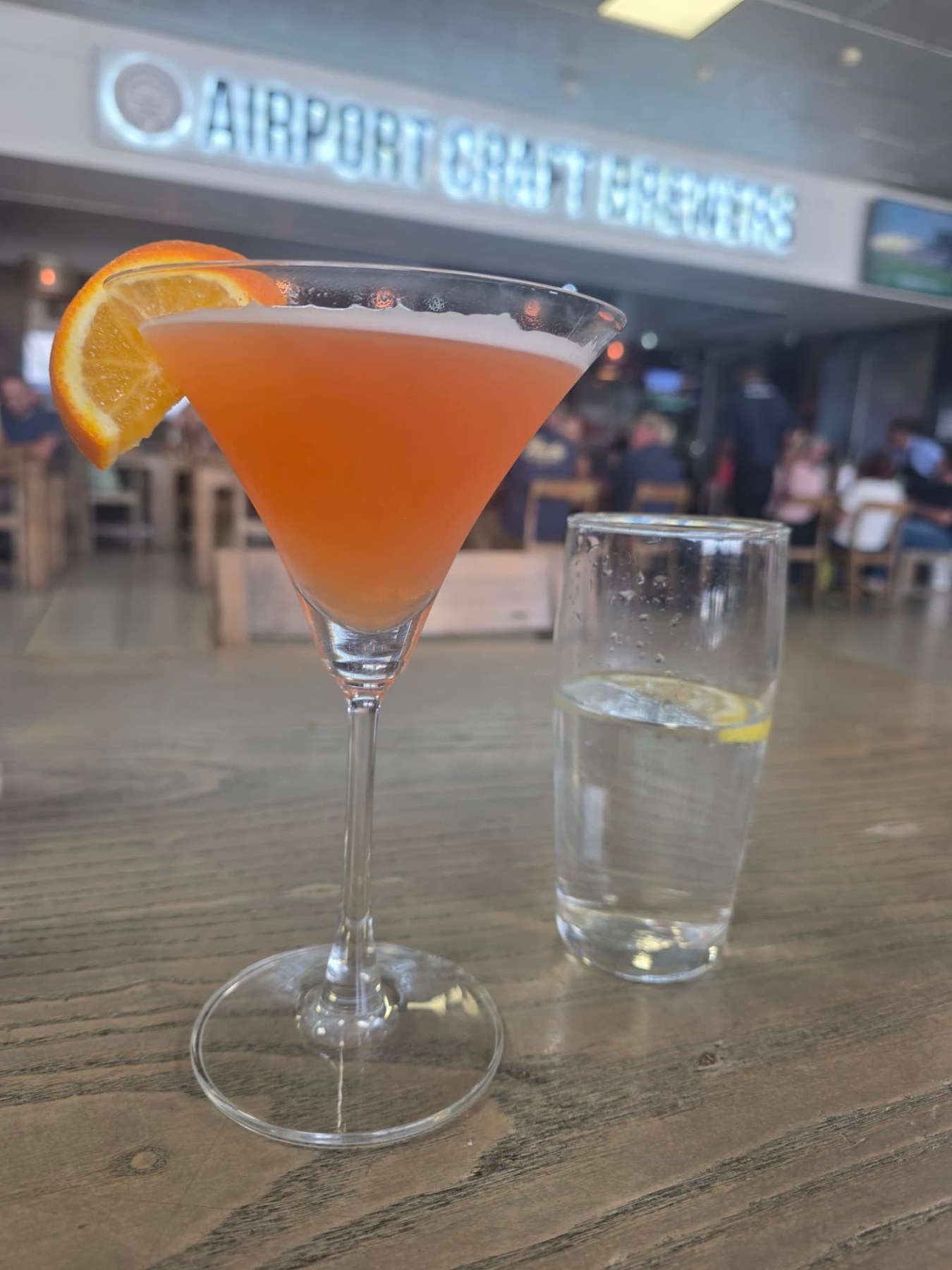 An airport toast before the next adventure